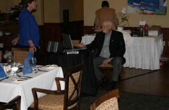 K4UEE Bob Allphin setting up computer for FT5ZM presentation.