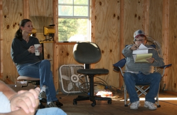 AE5MI enjoying her brew WD5BJT reading the minutes